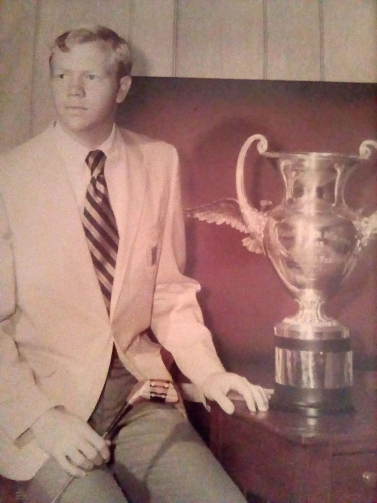 Scott Bess with the Missouri State Amateur trophy.